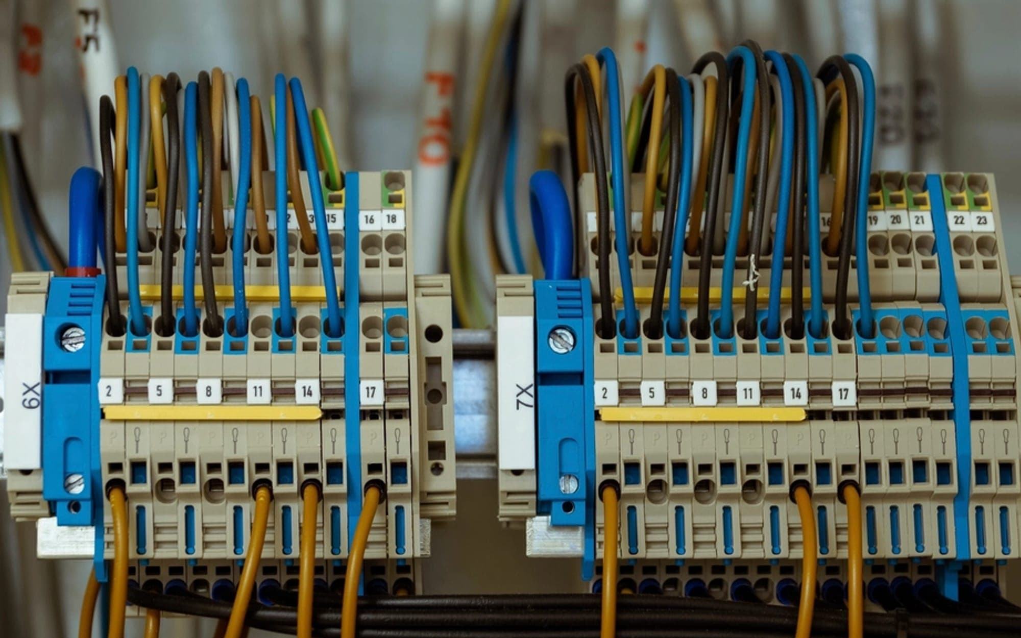 Row of circuit breakers and wiring inside an electrical panel